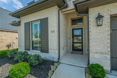 Tall 8 ft entry door with glass panels.