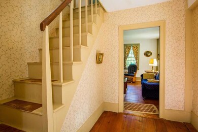 Stairway and entry into living room