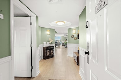 Corridor featuring light hardwood / wood-style flo