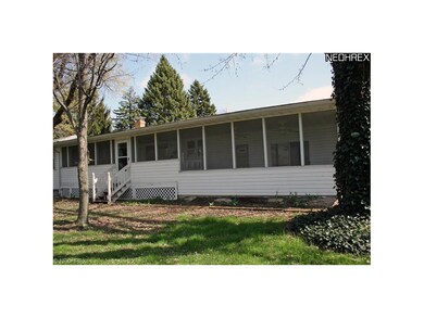 View of the screened porch from the back yard