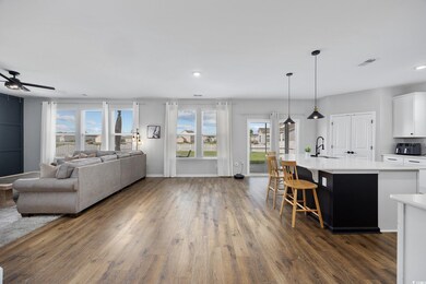 Interior space with dark hardwood / wood-style flo