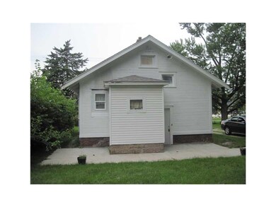 Exterior Back. Notice the New Concrete Patio