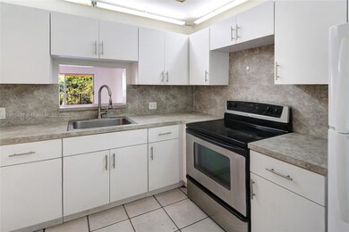 Capri Gardens Condominiums unit C403, Miami, FL 33161 - photo 2