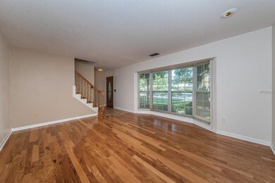 Real Hickory hardwood floors and bay window in the