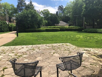 Rear flagstone patio and spacious back yard