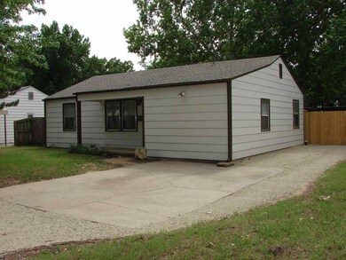 Large driveway leads to 24 x 30 garage out back