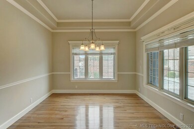 Bright Formal Dining Room with courtyard views