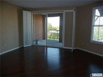 Living room and dining area. Sliding door to huge 