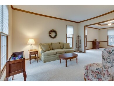 Lovely living room opens to foyer and dining room!