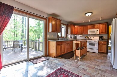 Kitchen with sliding glass doors to the back deck