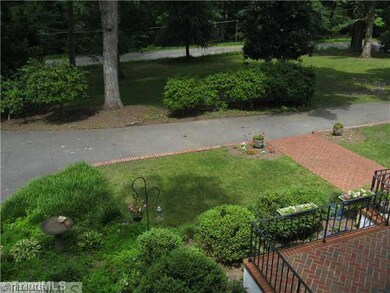 Exterior Front. Beautiful landscaping enhances the front porch.