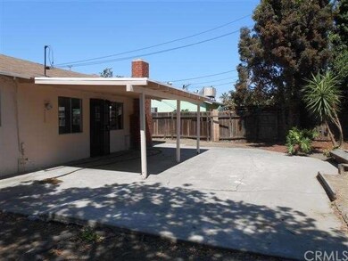 Back yard with covered patio