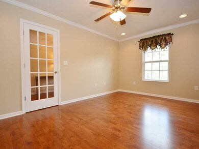 Den. This first floor den offers crown moldings, r