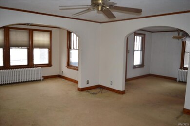 Living room and dining room. Lots of character wit