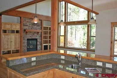 Breakfast bar with vegetable sink.