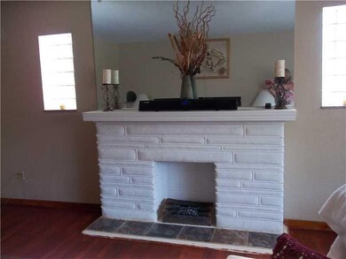 Exterior Front. Decorative brick fireplace with sl