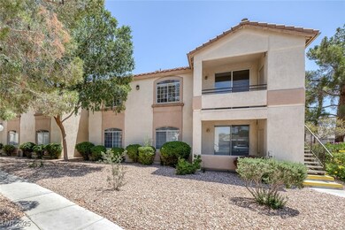View of front of home featuring stairway, stucco s