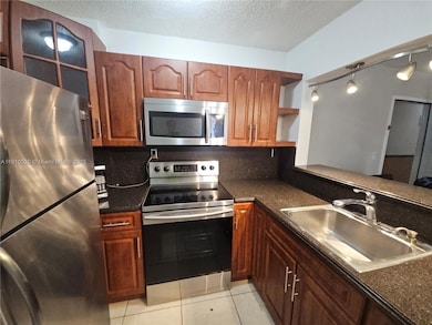 8145 NW 7th St unit 411, Miami, FL 33126 - photo 5