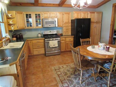 Big kitchen with lots of nice cabinets and an awes