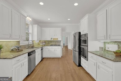 Granite countertops and under cabinet lighting.