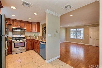 View of the remodeled kitchen and living room