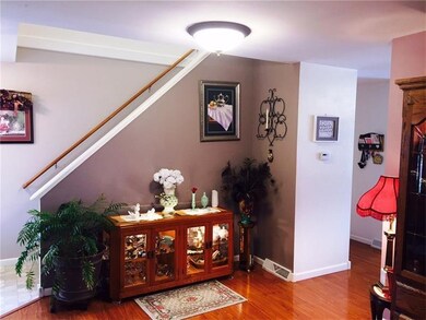 A pop of color highlights the corner of the living