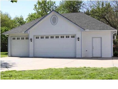 Over-sized 3 car Detached garage/workshop. Heated 