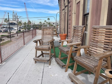 Your area of the shared balcony overlooking harbor