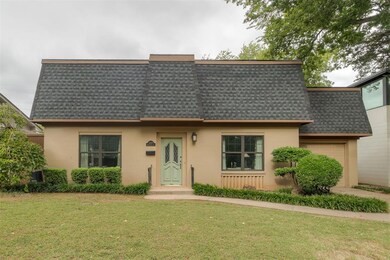 View of the front of the home with garage.