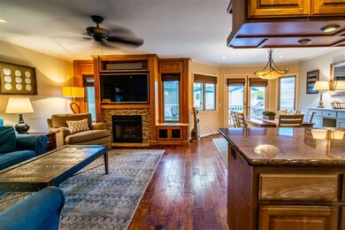 Upper Unit open concept living, dining and kitchen