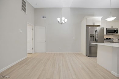 Kitchen featuring appliances with stainless steel