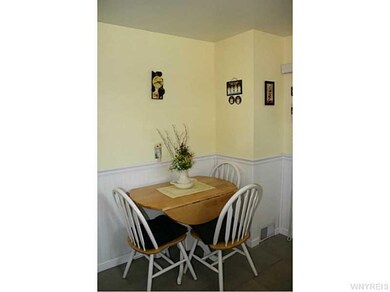Kitchen Dining. Wainscoting adds a nice touch!