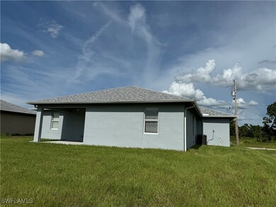 954 Genoa Ave S, Lehigh Acres, FL 33974 - photo 4