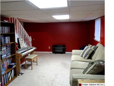 Finished den downstairs or 5th bedroom has 2 windo