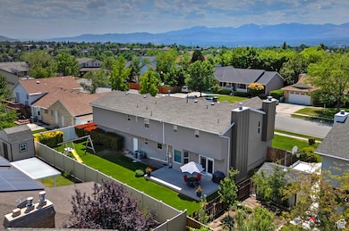 Aerial view of residential area with a mountain backdrop