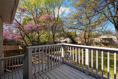 Deck off of kitchen/breakfast room leads to fenced back yard