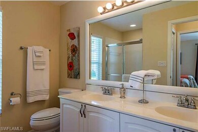 Immaculate guest bath with double sinks