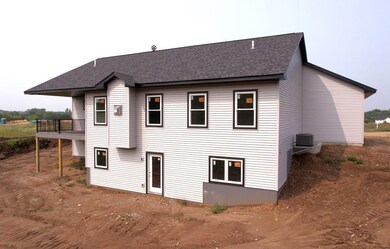 Walkout lower level and a covered maintenance free deck!