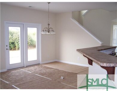 Interior Space/Layout. Breakfast area and kitchen 
