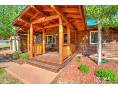 Front Patio Vaulted Entry Log Accents