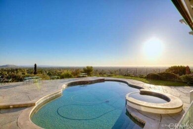 Stunning Sunsets From This Incredible View Home. Stamped Concrete, Pebble Tech Saltwater Pool & Spa With Water Features, Changing Lights And More. This Beautiful Yard Will Accommodate Over 100 Guests For Formal or Informal Functions. Mountain View To