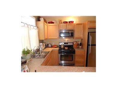 Kitchen. Photo of similar unit.