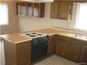 ANOTHER VIEW OF KITCHEN.