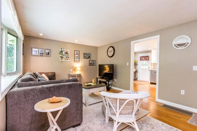 Living room opens to kitchen
