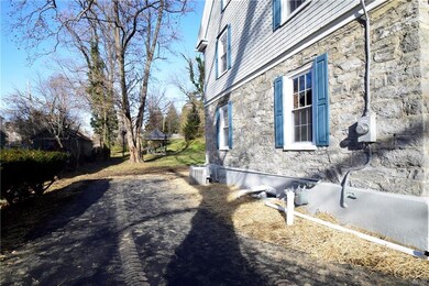 Convenient driveway will fit two cars with ease