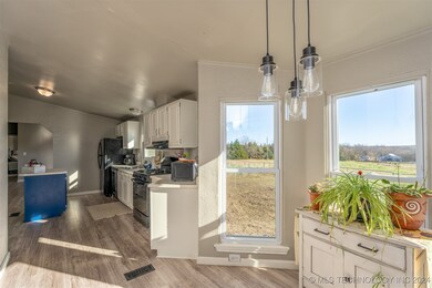 breakfast nook/office with bay windows overlooking