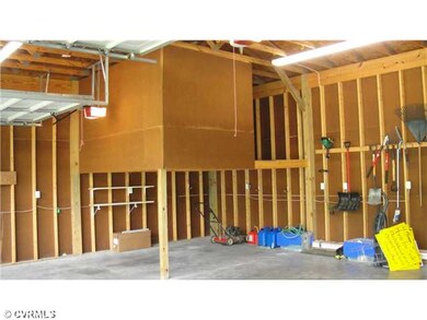 Parking Lot/Garage - ** 4 Car Garage with 2 storag