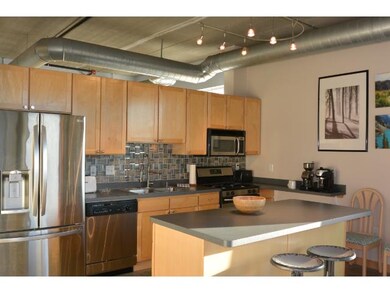 The kitchen features quality stainless steel appli