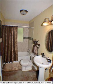 Hall bath with brand new tile surround