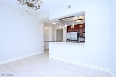 Kitchen with pendant lighting, stainless steel fri
